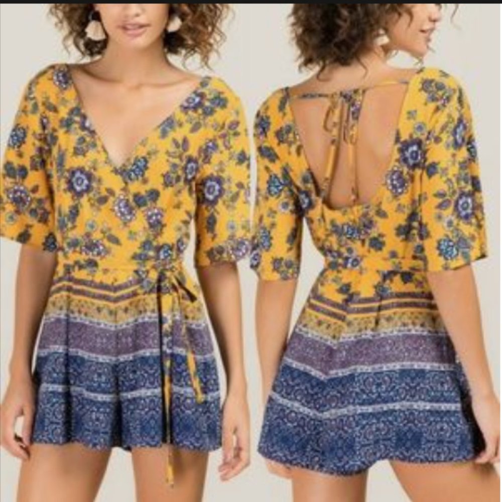 Miami size Medium Short-Sleeve Yellow and Blue Floral Romper.